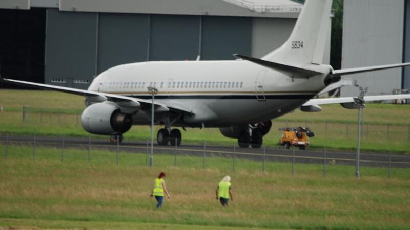 TDs Mick Wallace and Clare Daly during their alleged attempt to search two planes believed to be used by the US military at Shannon Airport.  Photograph: PA handout from Shannon Watch