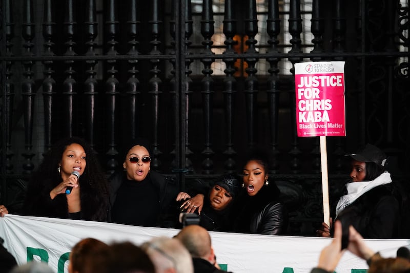 Temi Mawale (left), Kayza Rose (second left) and Sheeda Queen (centre) demonstrate outside the Old Bailey in central London after Martyn Blake's acquittal. Photograph: Jordan Pettitt/PA Wire 