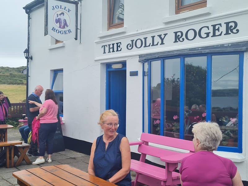 Publican Deirdre Murphy Youell chatting to a customer at the Jolly Roger in Sherkin Island.