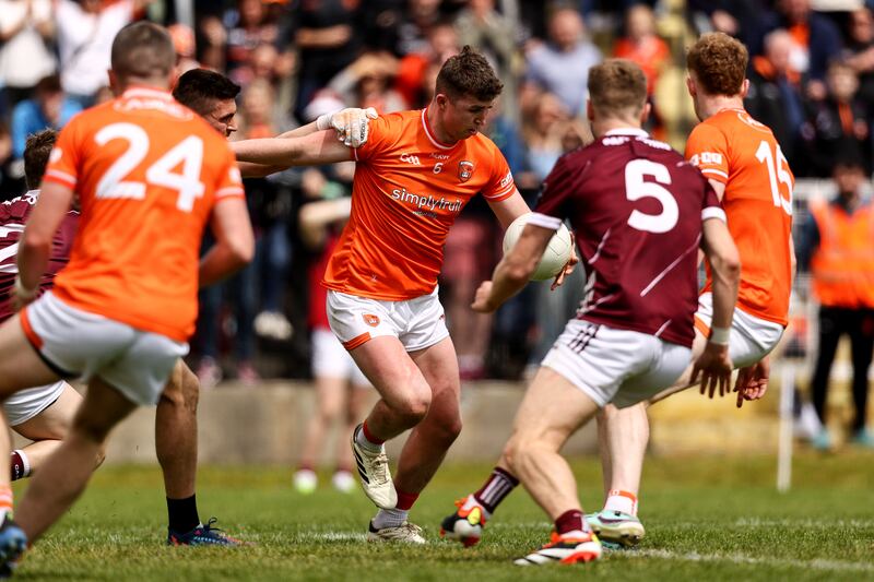 Armagh's Tiernan Kelly breaks past Galway goalkeeper Connor Gleeson to score a goal during the game in Sligo. Photograph: Ben Brady/Inpho