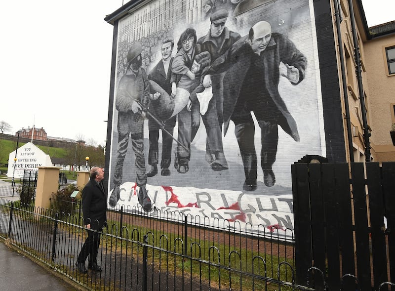 Archbishop Eamon Martin at a mural in the Bogside depicting an event of Bloody Sunday on January 30th, 1972. Photograph: Trevor McBride