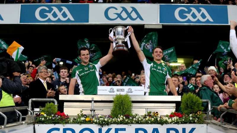 Ireland’s Michael Murphy and Aidan Walsh lift the trophy after the International Rules second Test victory at Croke Park last October. Photograph: Inpho