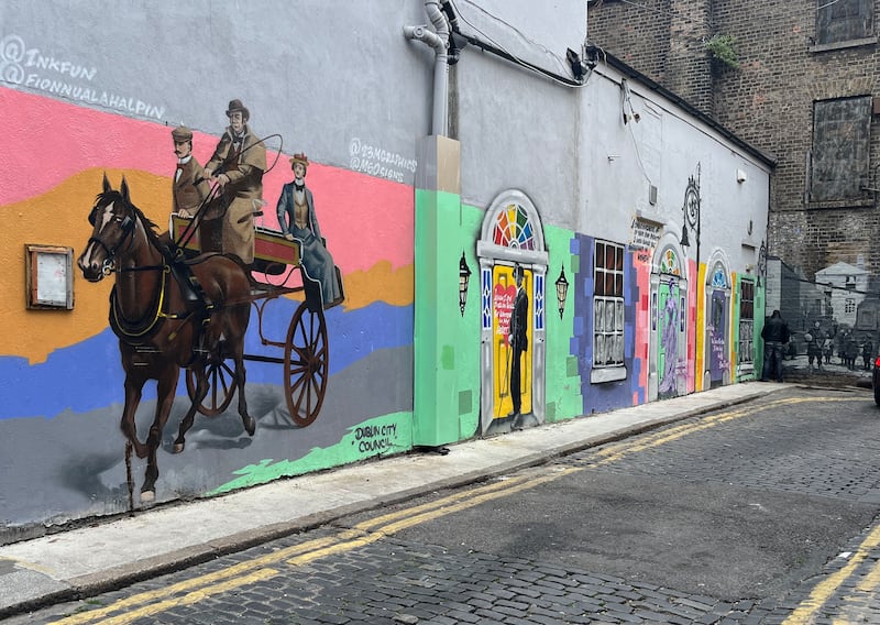 Murals along part of the street. Photograph: Alan Betson