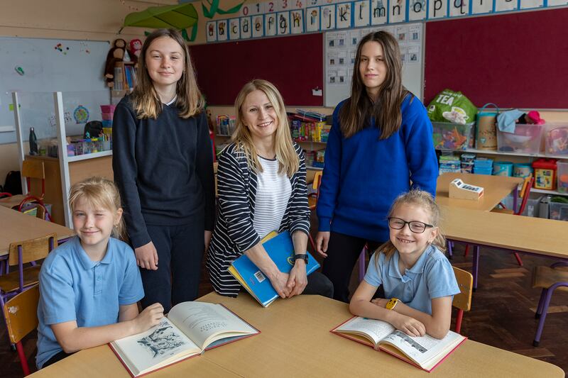 Ukrainian teacher Olha Mahdyk who is teaching in St Joseph's Primary School, Tipperary town, with students from Ukraine, Sofia and Diana Kucherak [seated], Vasilisa Kichka and Oksana Semenova. Photograph: John D Kelly