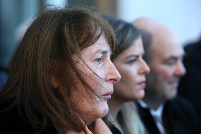 Ashling Murphy's mother Kathleen outside the Criminal Courts of Justice alongside sister Amy and father Ray. Photograph: Collins Courts