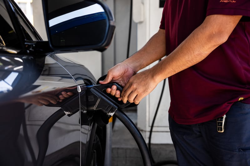 Depending on the model of EV and the charging point you have, it could take anywhere from four to 20 hours to go from empty to full, although  about eight hours is more typical. Photograph: Lauren DeCicca/Getty 