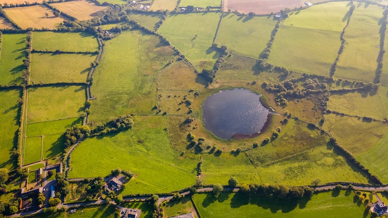 Aerial view of lands and lake