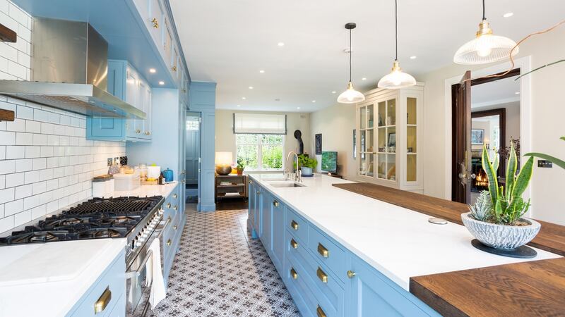 Kitchen: the units in this space are a warm, cornflower blue colour