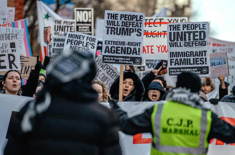 Activists in Chicago protesting last Sunday against Trump’s threat of mass deportations. Photograph: Jamie Kelter Davis/The New York Times                  