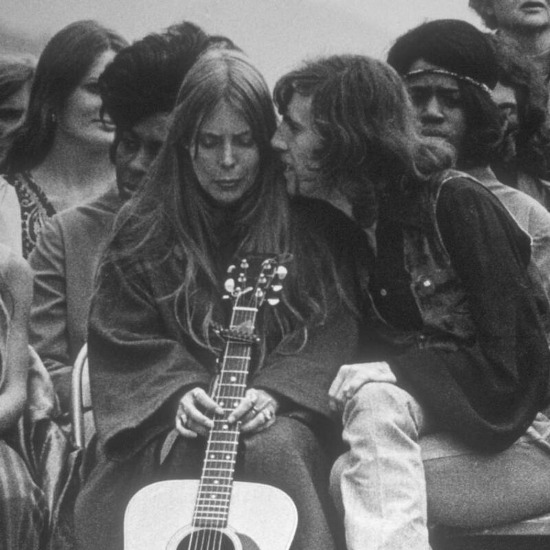 Joni Mitchell and Graham Nash at The Big Sur Folk Festival (1969). Photograph: Robert Altman/Michael Ochs Archives/Getty Images