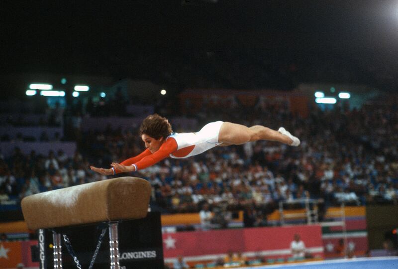 Gymnast Mary Lou Retton performs in the vault competition during the Olympic Games in Los Angeles in 1984. Photograph: Getty Images