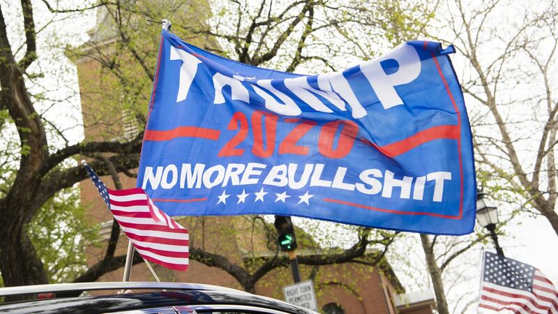 “Trump 2020 – No More Bullshit” – an exhalation of disgust rather than a statement of belief, but it has an undeniable power all the same. Photograph: Tom Williams/Getty Images