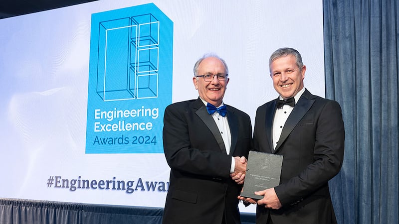 Matt Cotterell, awards judge, presents the engineering firm of the year (100+ employees) award to Colm Devin, Ethos Engineering