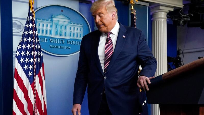 US president Donald Trump leaves the podium after speaking at the White House on Thursday. Photograph: Evan Vucci/AP Photo