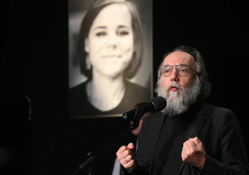 Aleksandr Dugin, a leading advocate for the Russian invasion of Ukraine, at a mourning ceremony for his daughter Darya, who was killed when her car exploded on the outskirts of Moscow. Ilya Ponomarev claims to have had advance knowledge of the attack. Photograph: Dmitry Serebryakov/AP