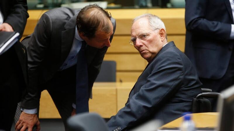 German finance minister Wolfgang Schauble (R) and Dutch State Secretary of Finance Eric Wiebes at the start of a special Eurogroup meeting on Greece at European Council headquarters in Brussels, Belgium. Photograph: Olivier Hoslet/EPA