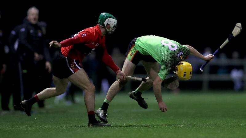 UCC’s Shane Kingston contests for the ball with Richie Leahy. Photograph: James Crombie/Inpho