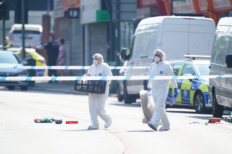 British police forensics officers on Ilkeston Road, Nottingham investigating the incident. Photograph: Zac Goodwin/PA Wire