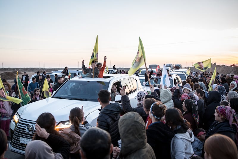 Crowds in Hasaka welcome back a convoy of civilians who were protesting at the Tishreen Dam. Photograph: Sally Hayden