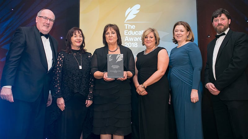 Jane O'Keefe, JC & Director of Supply Chain, NMCI/CIT presents Best Business & Third Level Institution Collaboration award to The Insurance Institute of Ireland & IT Sligo Team.