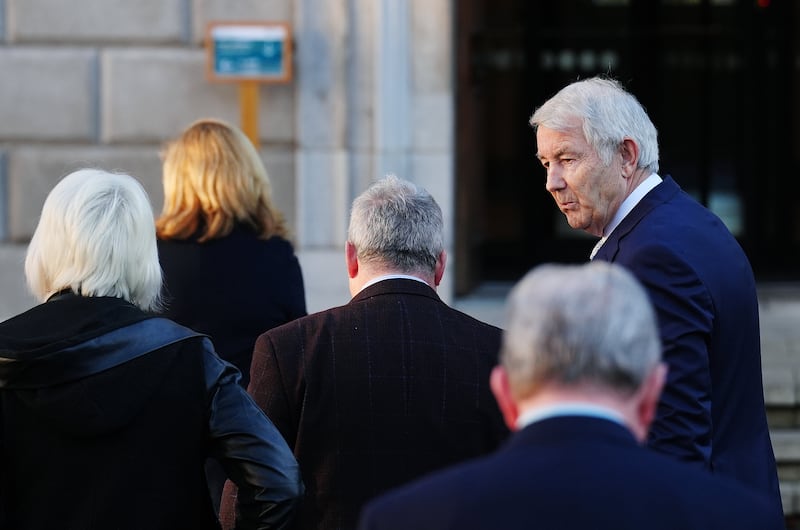 Independent TD Michael Lowry with members of the Regional Independent Group following a press conference at Leinster House in Dublin, after a deal was reached to form the next government. Photograph: Brian Lawless/PA Wire