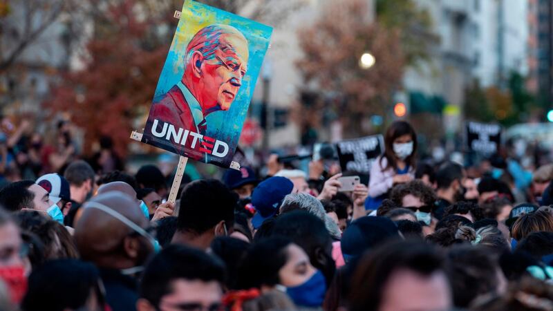 Black Lives Matter Plaza: Celebratory scenes were replicated across US cities.   Photograph: Andrew Caballero-Reynolds