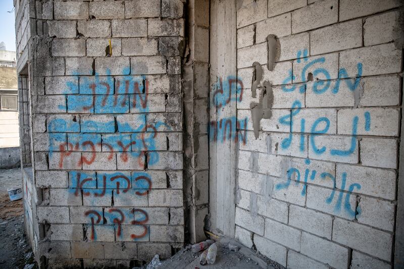 Hebrew graffiti in Aitaroun reading "death to Arabs" and "Kahane was right". Photograph: Sally Hayden