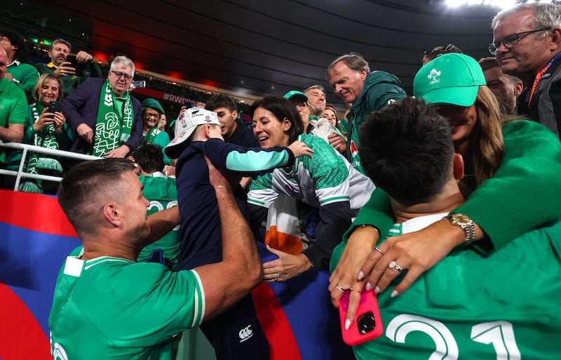 Ireland’s Johnny Sexton celebrates winning with his son Luca and wife Laura after the win over South Africa. Photograph: Dan Sheridan/Inpho