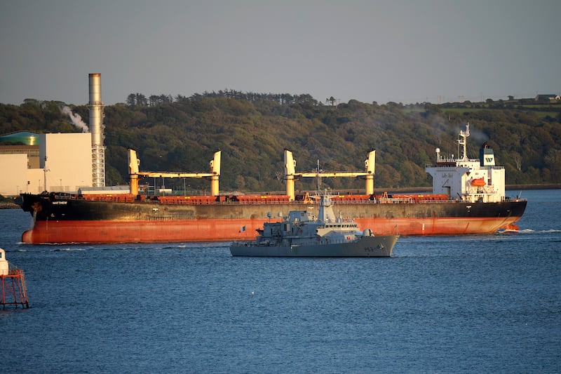 A cargo vessel named the MV Matthew is escorted into Cobh in Cork by the Irish Navy. Photograph: Niall Carson/PA Wire