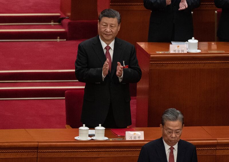 Chinese president Xi Jinping applauding National People's Congress chairman Zhao Leji at the closing session of the congress at the Great Hall of the People in Beijing. Photograph: Kevin Frayer/Getty Images