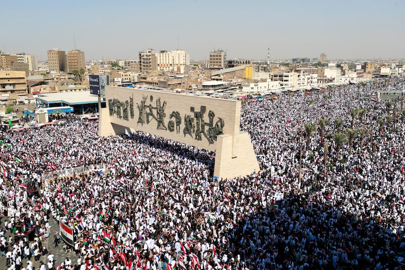 People gather at Tahrir Square for a demonstration against Israel in Baghdad on Friday, October 13th. Photograph: Ahmad Al-Rubaye/AFP via Getty Images)