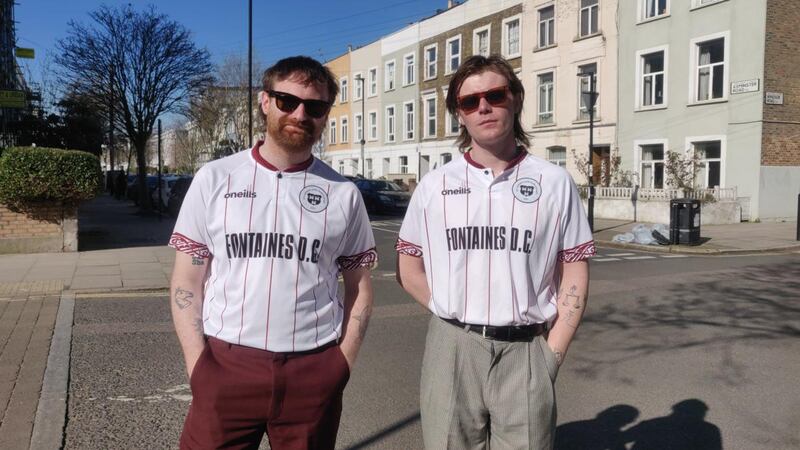 Tom Coll (left) and Conor Curley of Fontaines DC wearing the new Bohemians jersey. A portion of the proceeds from the sale of the jerseys will go to homeless charity Focus Ireland. Photograph: abutchershook.com