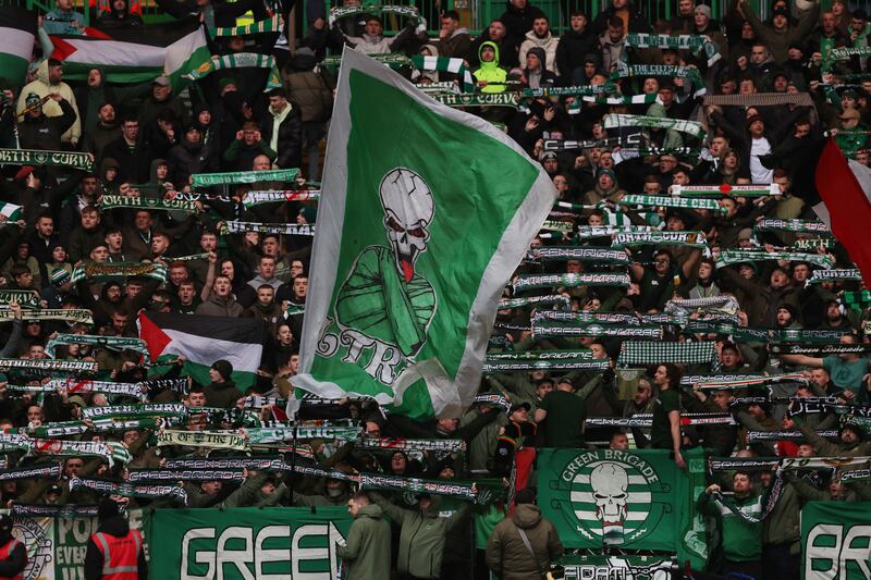 The Green Brigade make their support clear during Celtic's match against Livingston. Photograph: Ian MacNicol/Getty Images