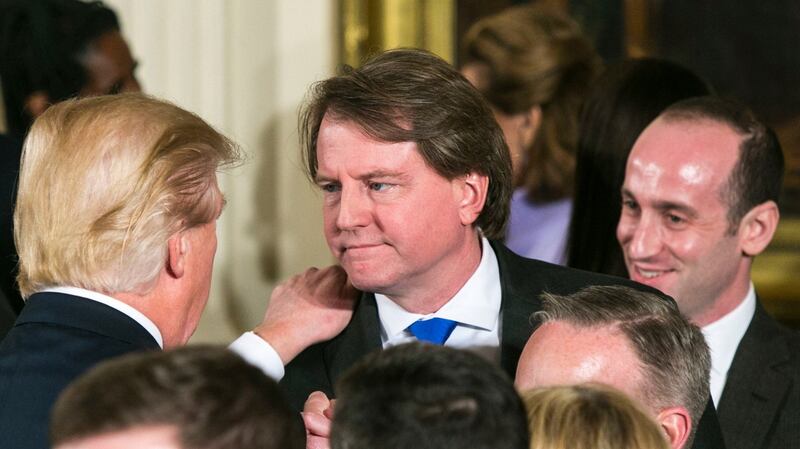 The New York Times reported that Donald Trump ordered the dismissal of special counsel Robert  Mueller but ultimately decided not to carry this out after White House senior counsel Donald McGahn (above with Mr Trump a year ago) threatened to resign.  File photograph: Al Drago/New York Times