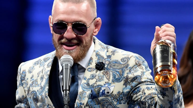 Conor McGregor holding his “Notorious” brand of whiskey. Photograph: Ethan Miller/Getty Images