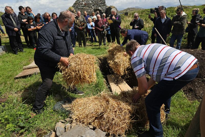 The 13 skulls are reinterred in St Colman's Cemetery on Sunday, following Mass at St Colman's Church on Sunday. Photograph: Nick Bradshaw for The Irish Times