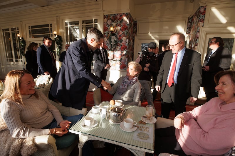 Taoiseach Simon Harris is introduced by Fine Gael candidate Frank Feighan (centre right) to constituents as he arrives at the Landmark Hotel in Carrick-On-Shannon in Co Leitrim last week. Liam McBurney/PA Wire