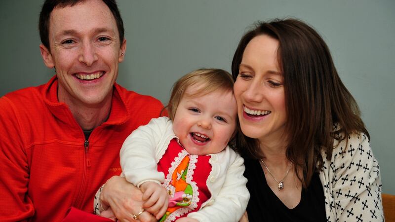 Louise O’Brien pictured with her daughter Eabha Griffin aged 20 months and her husband Mike Griffin. Photograph: Aidan Crawley