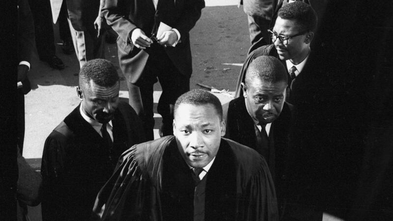 Civil Rights leaders Fred Shuttlesworth (left), Martin Luther King, and Ralph Abernathy (right) attend a funeral for victims of the 16th Street church bombing in Birmingham, Alabama, 1963. Photograph: Declan Haun/Chicago History Museum/Getty Images