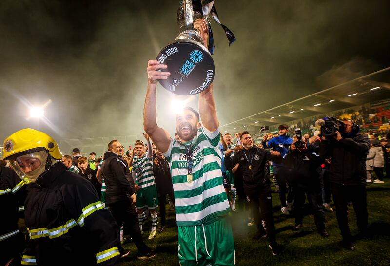 Roberto Lopes celebrates with the trophy after Shamrock Rovers secured the SSE Airtricity League Premier Division title at Tallaght Stadium in November. Photograph: Ryan Byrne/Inpho