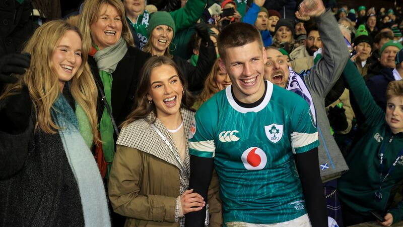  Ireland's Sam Prendergast and with his partner Anna Walsh after the match in Edinburgh. Photograph: Dan Sheridan/Inpho