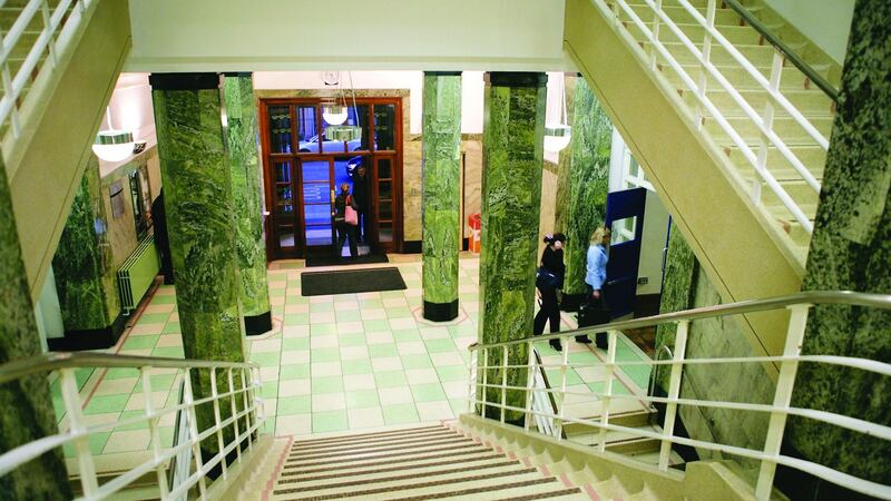 The vestibule inside the fomer College of Catering ‘has octagonal columns and Connemara marble cladding . . . a patterned terrazzo imperial stair with chrome-clad steel railings’. Photograph: Technological University Dublin