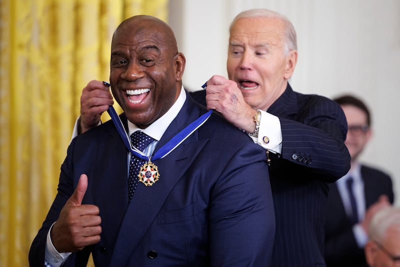 Former NBA player Earvin 'Magic' Johnson receives the Presidential Medal of Freedom from US president Joe Biden in the East Room of the White House in Washington DC last weekend. Photograph: Tom Brenner/Getty 