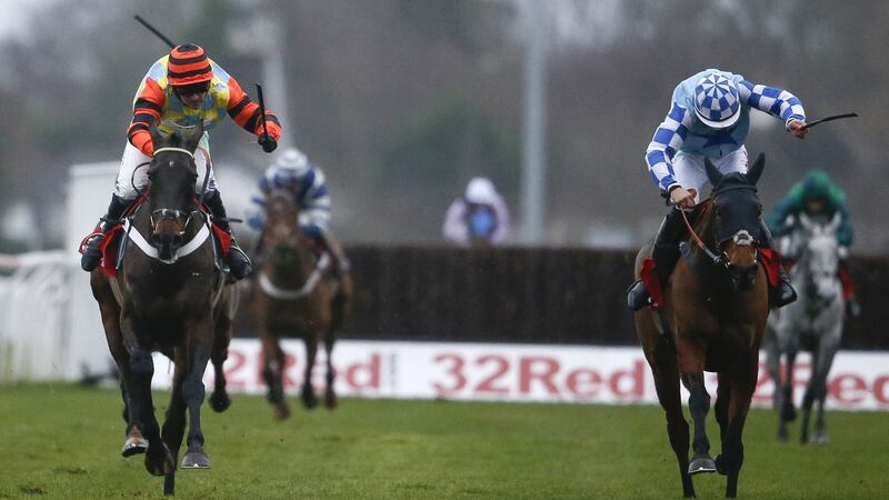 Might Bite holds off Double Shuffle in the King George. Photograph: Alan Crowhurst/Getty