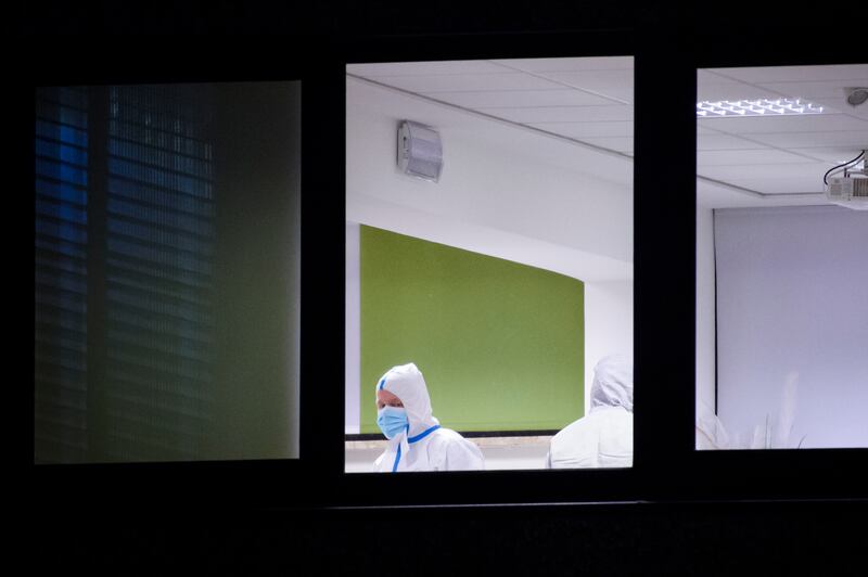 Emergency crews in the community centre at Alsterdorf district in Hamburg, Germany where the shooting took place. Photograph: Gregor Fischer/Getty Images