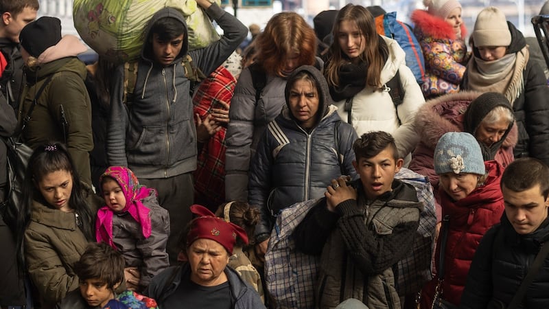 Passengers depart the railway station after disembarking from trains from the east  in Lviv, Ukraine. Photograph: Dan Kitwood/Getty