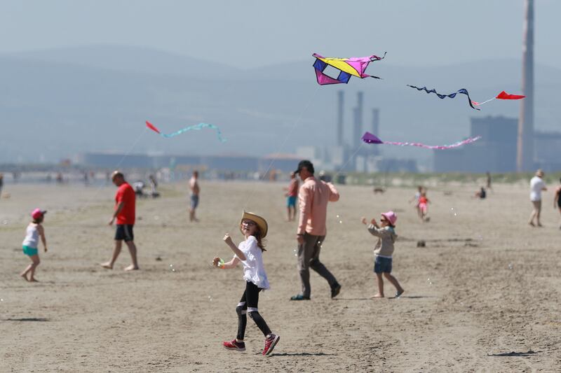 Youngsters fly kites on North Bull Island, Clontarf, Dublin. Photograph: Nick Bradshaw