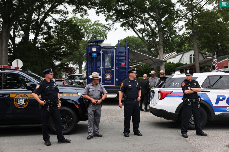 US police investigate the home of suspect Rex Heuermann arrested in the unsolved Gilgo Beach killings in Massapequa Park, New York. Photograph: Michael M Santiago/Getty 