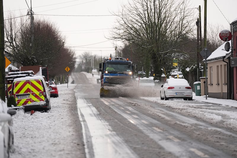 A gritting lorry at work on Sunday as much of the country shivered in the icy grip of bitterly cold weather. Photograph: Niall Carson/PA Wire