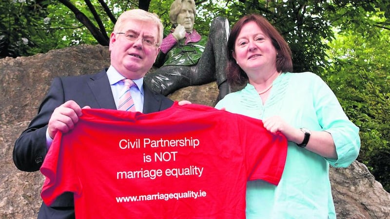 Tánaiste Eamon Gilmore and  Grainne Healy TD, Chairwoman of Marriage Equality. Photograph: Gareth Chaney/Collins